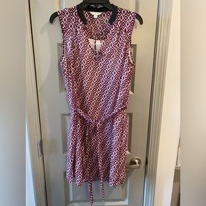 Burgundy colored dress with geometric design